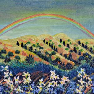 mountain with a rainbow in springtime