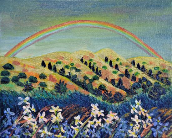 mountain with a rainbow in springtime